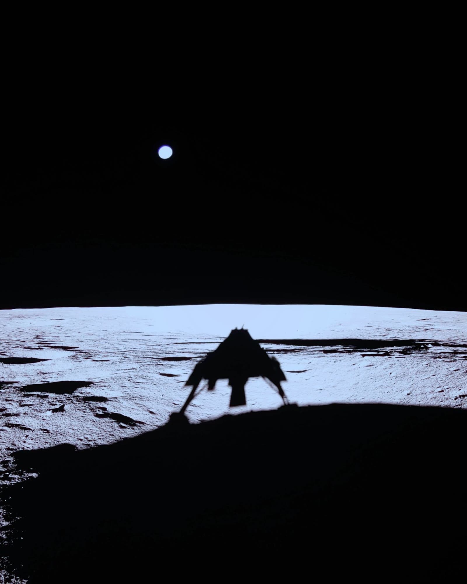 Firefly Blue Ghost lunar lander casting a shadow on the Moon.