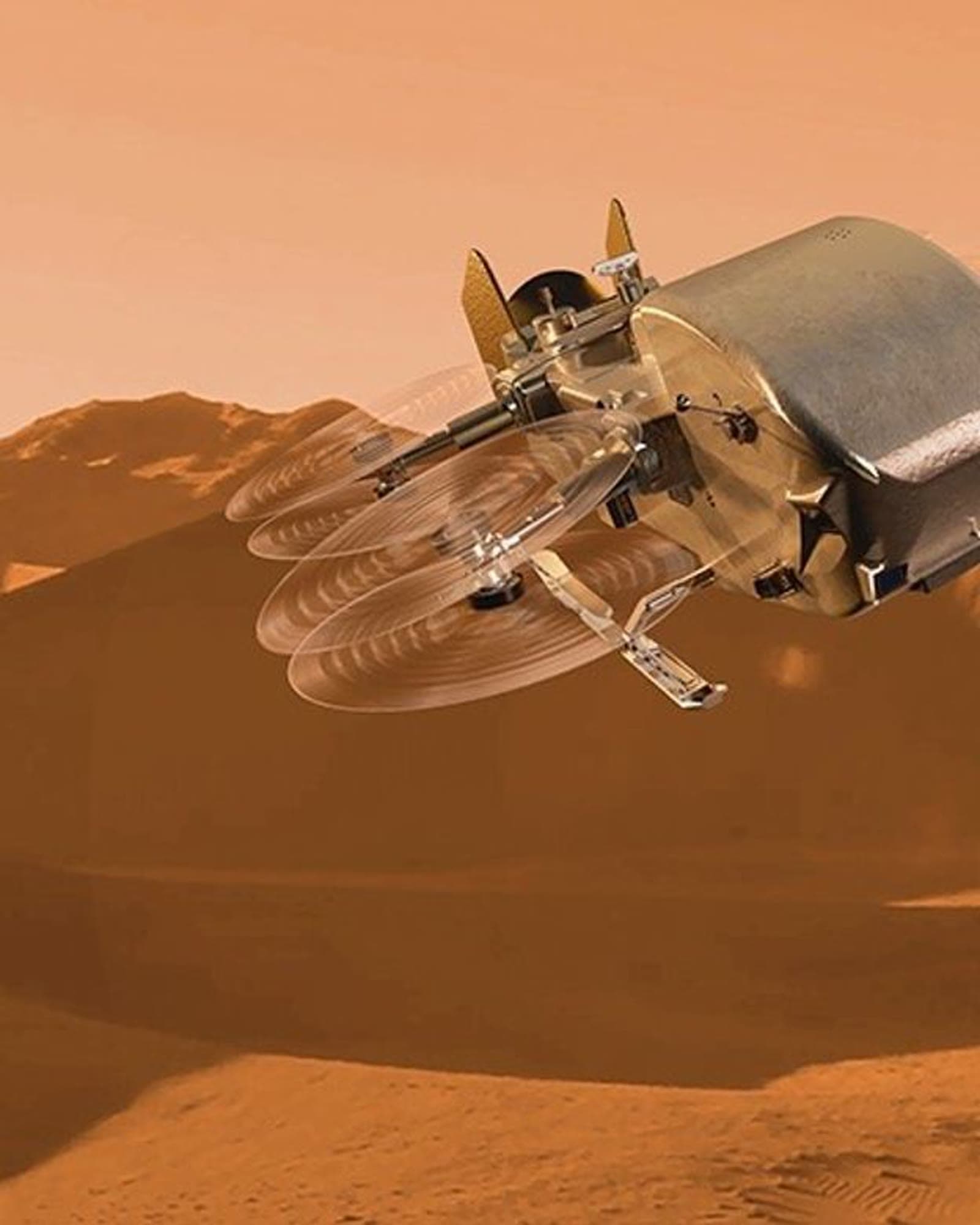 Artist concept of NASA's Dragonfly rotorcraft flying above Titan's orange dunes.