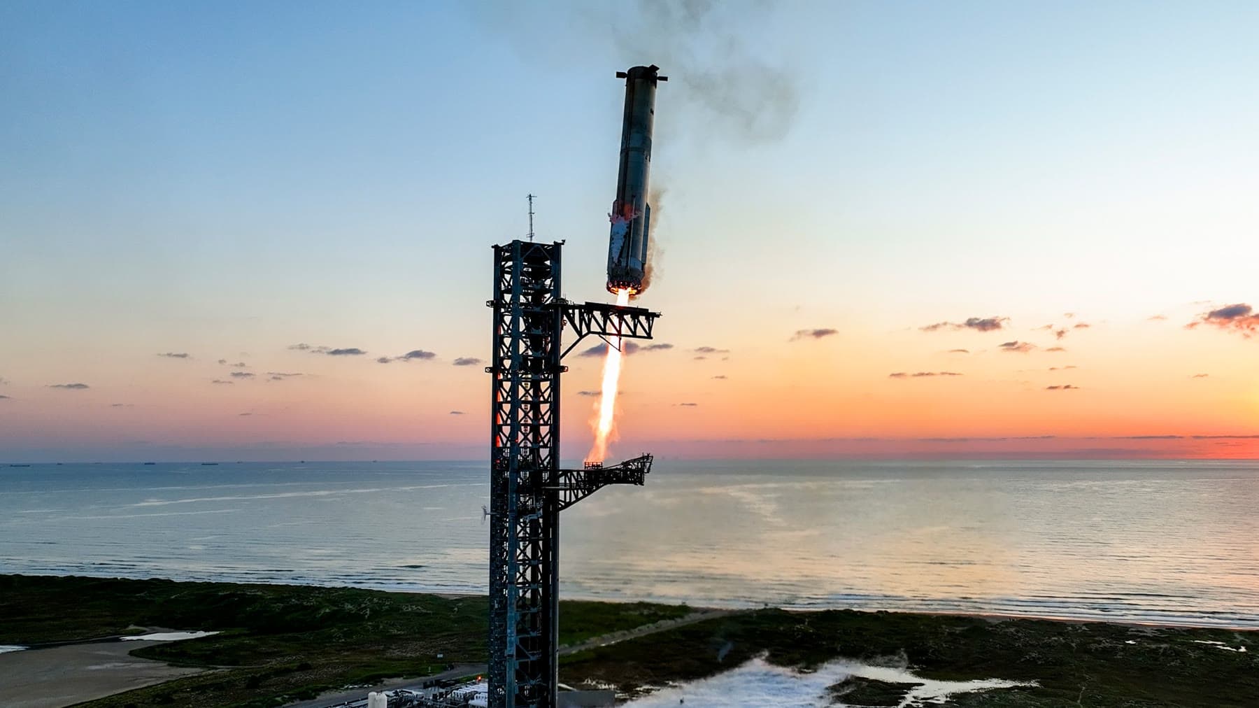 SpaceX Starship and launch tower at Starbase.
