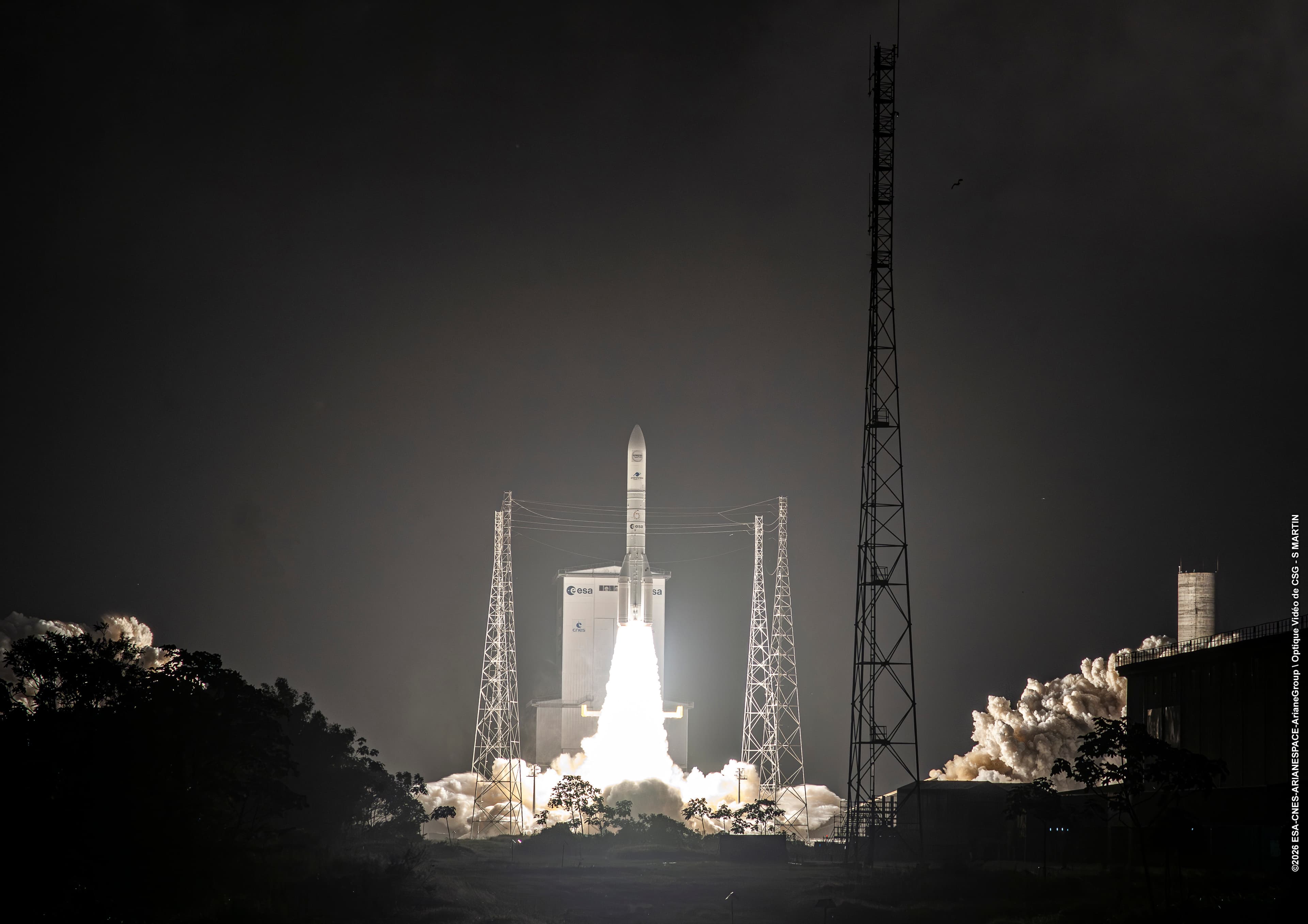 ESA's Ariane 6 lifting off at night from Europe's Spaceport in French Guiana.